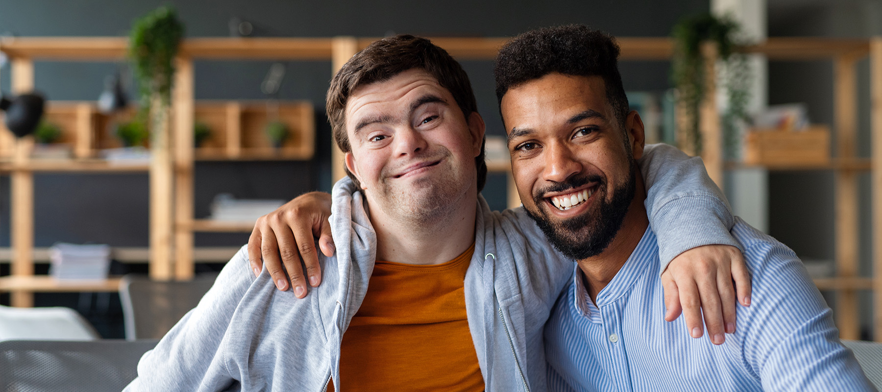 Member and Care Manager with their arms around their shoulders