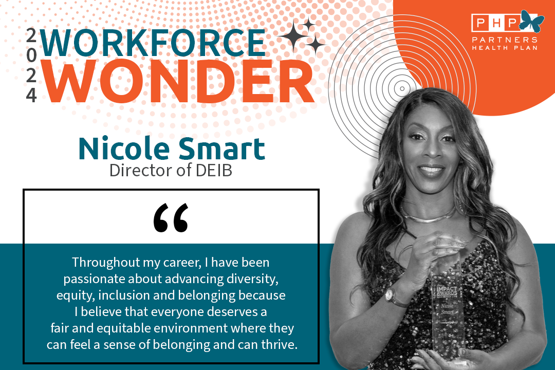 Nicole Smart holding her award